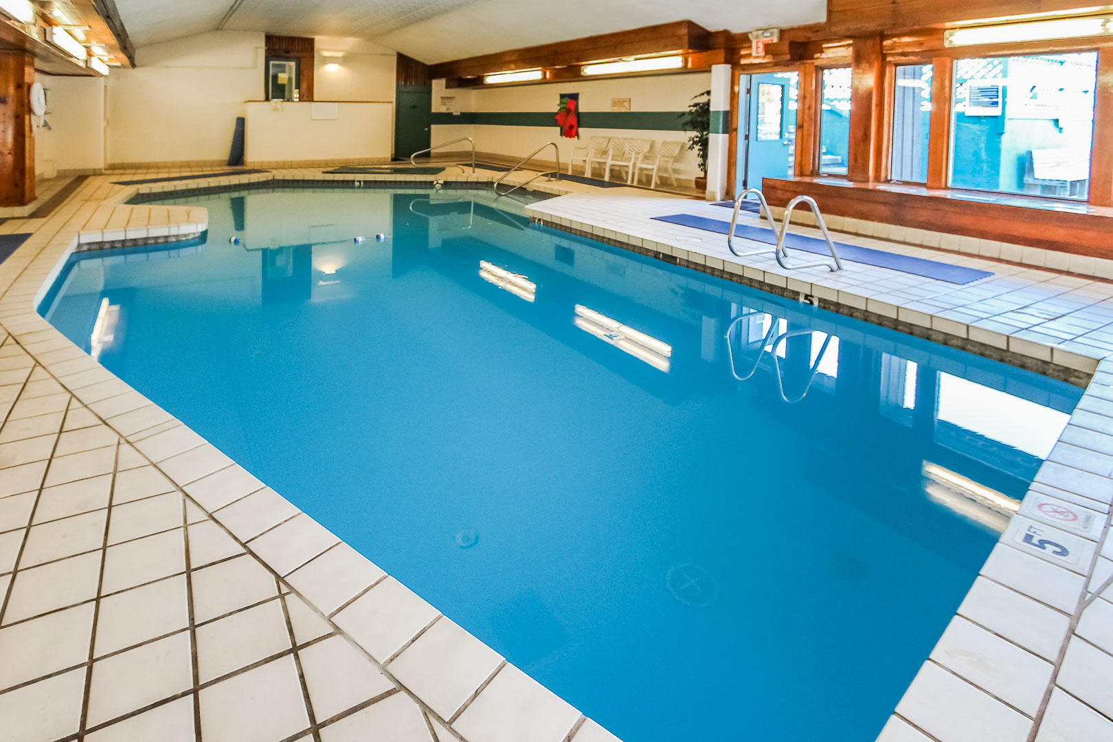 A spacious indoor swimming pool at VRI's Village of Loon Mountain in New Hampshire.